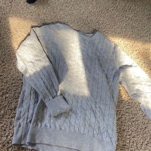 woman’s grey sweater